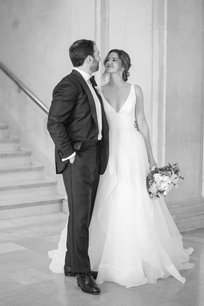 Plaza Hotel interior staircase first look with bride and groom