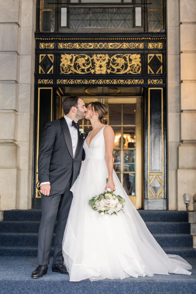 Plaza Hotel exterior portraits with bride and groom