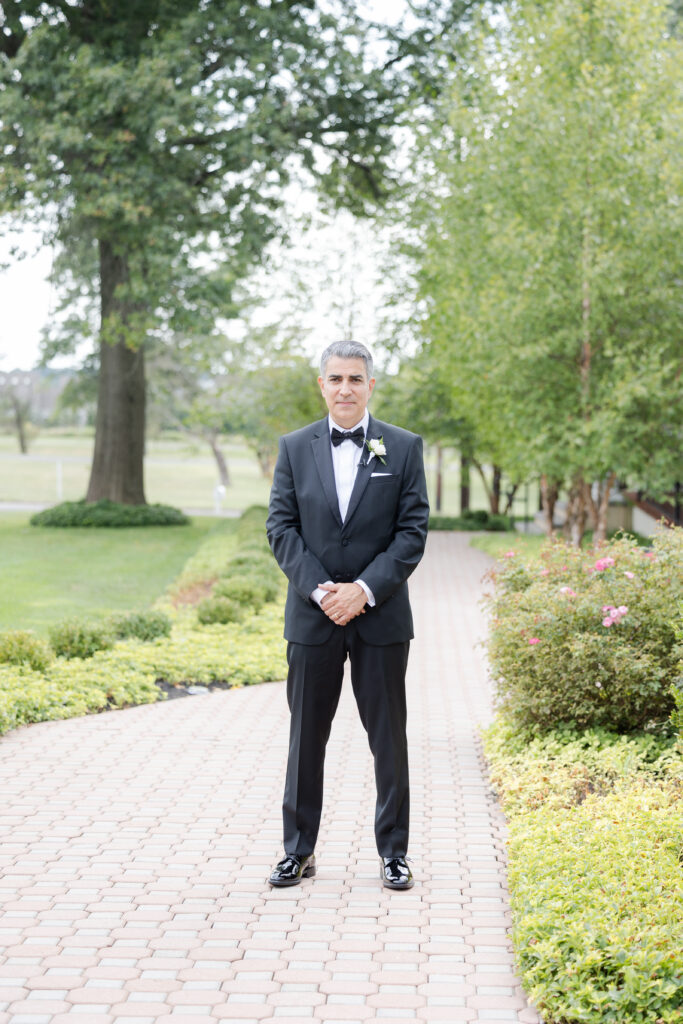 Dad first look outside of the Hayloft Cottage of the Ryland Inn wedding venue, northern New Jersey