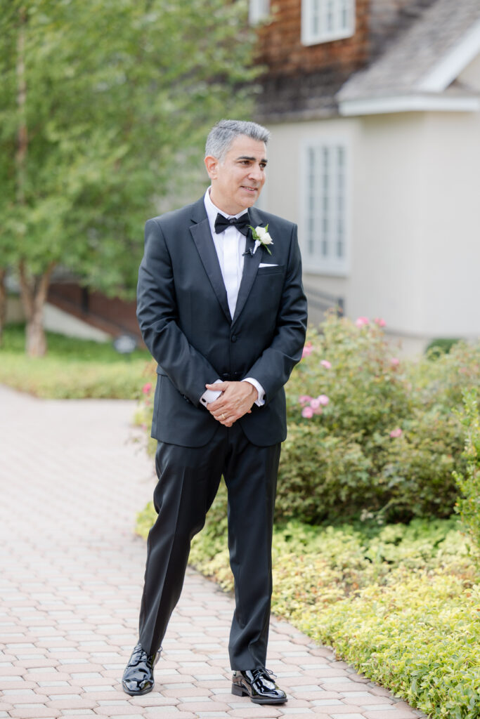 Dad first look outside of the Hayloft Cottage of the Ryland Inn wedding venue, northern New Jersey