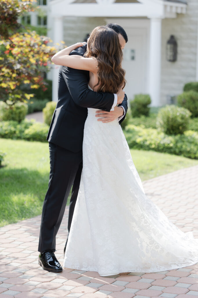 Groom first look outside of the Ryland Inn wedding venue, northern New Jersey