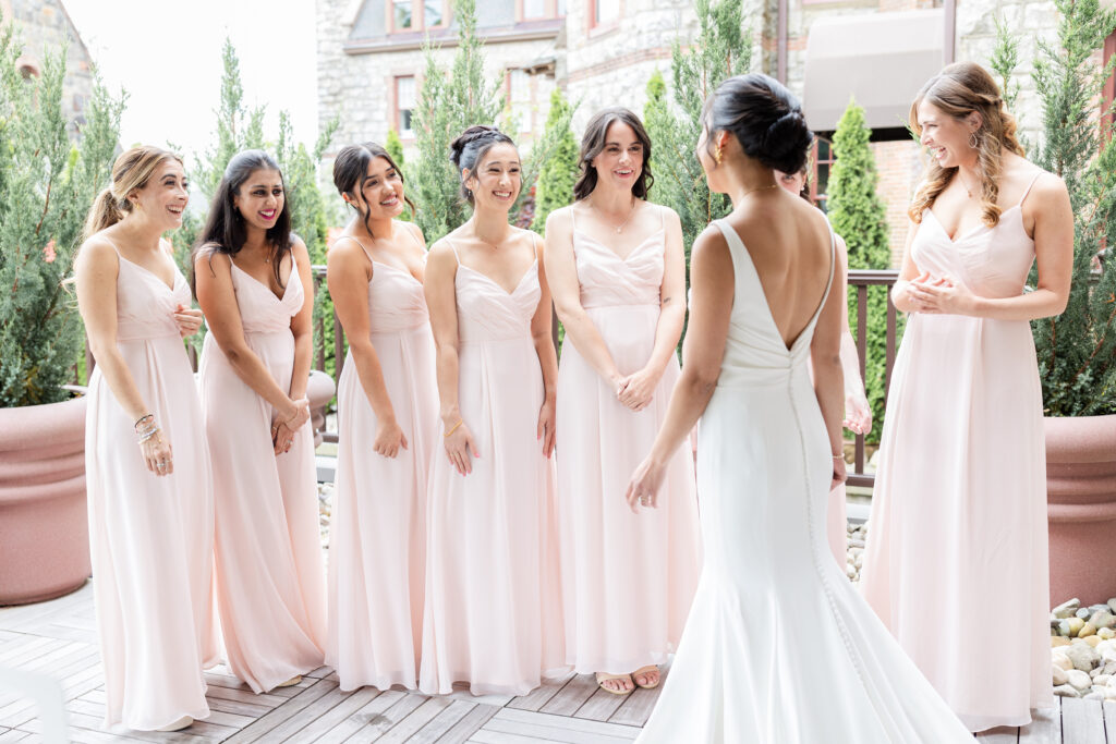 Bride and bridesmaid's first look