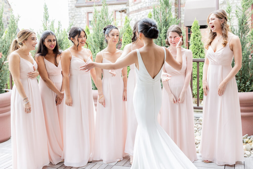 Bride and bridesmaid's first look