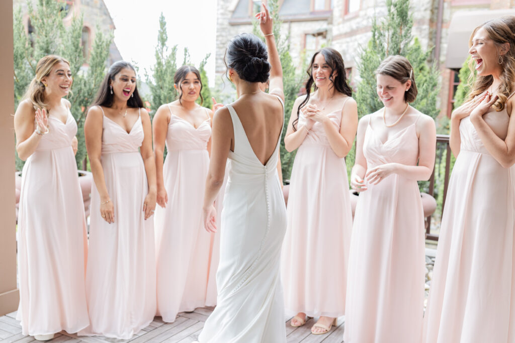 Bride and bridesmaid's first look