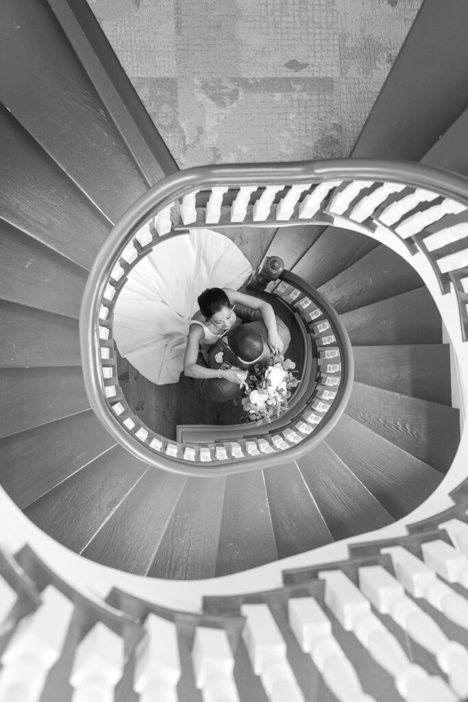 Bride and Groom Portraits at the spiral staircase inside the Hudson Valley Wedding Venue