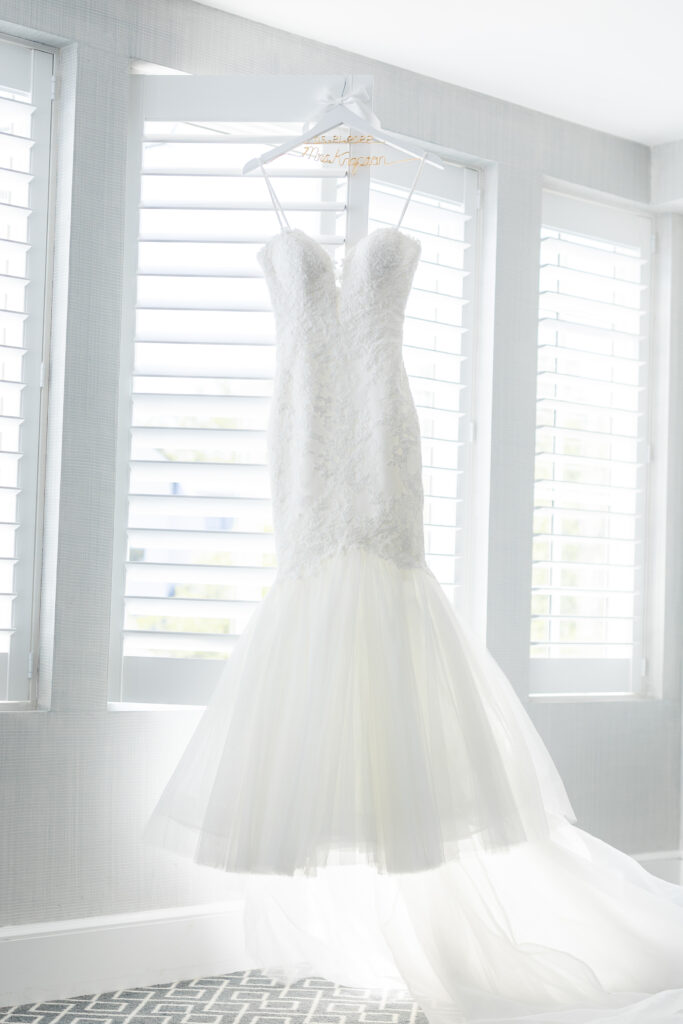 Bride white wedding dress inside bridal suite