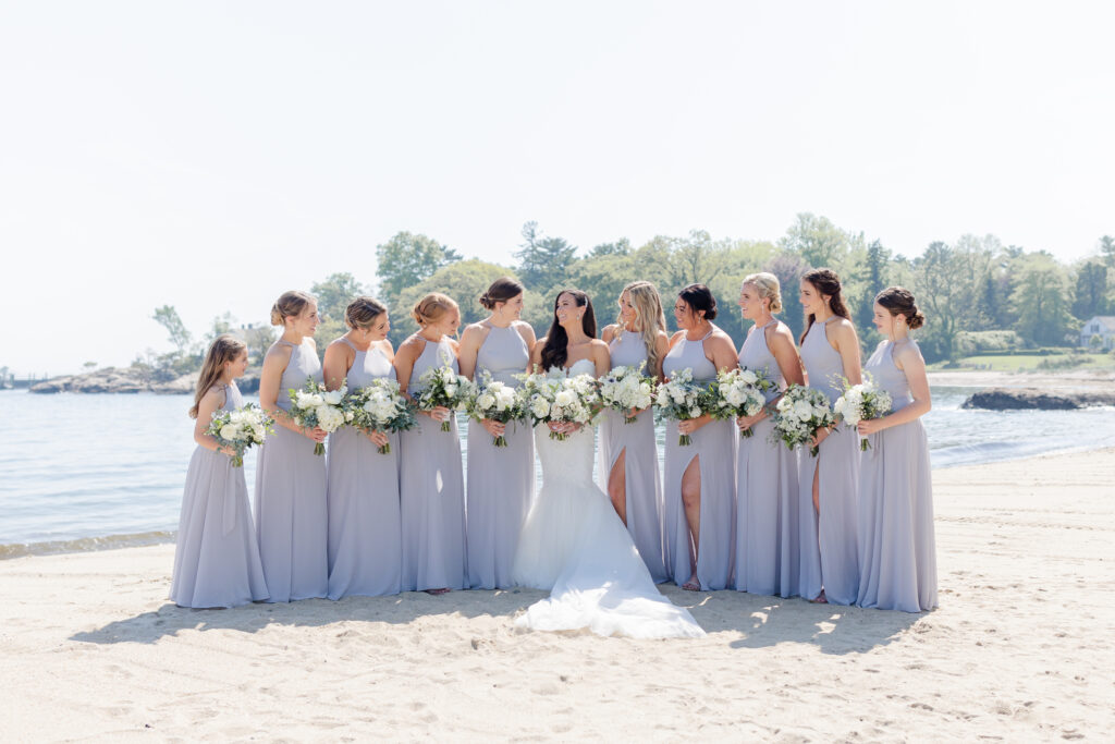 Bridal portraits on the beach outside of the clubhouse wedding venue