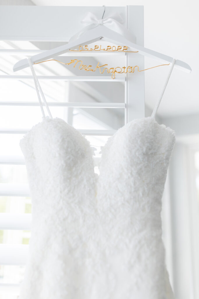 Bride white wedding dress inside bridal suite