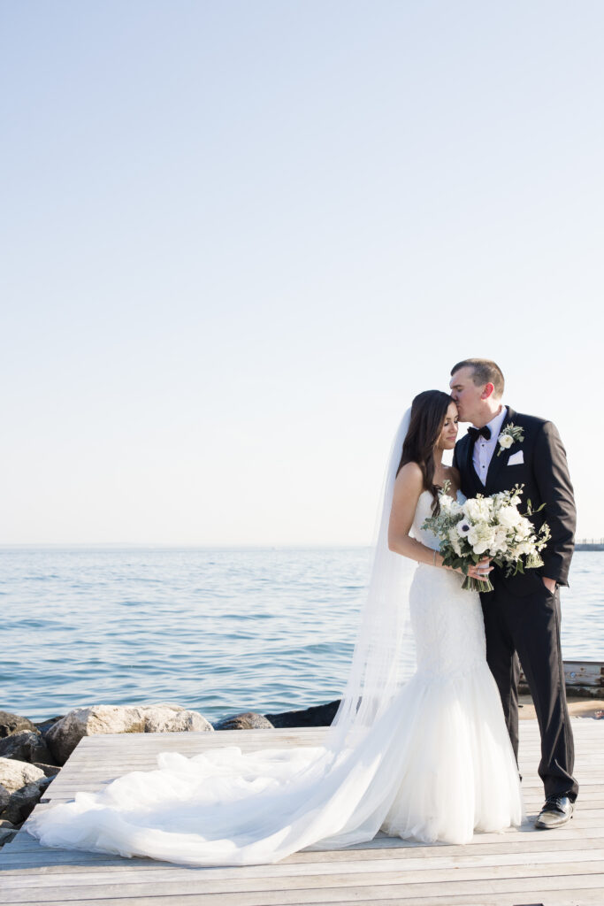 Bride and Groom Beach Wedding Portraits at Clubhouse Wedding venue