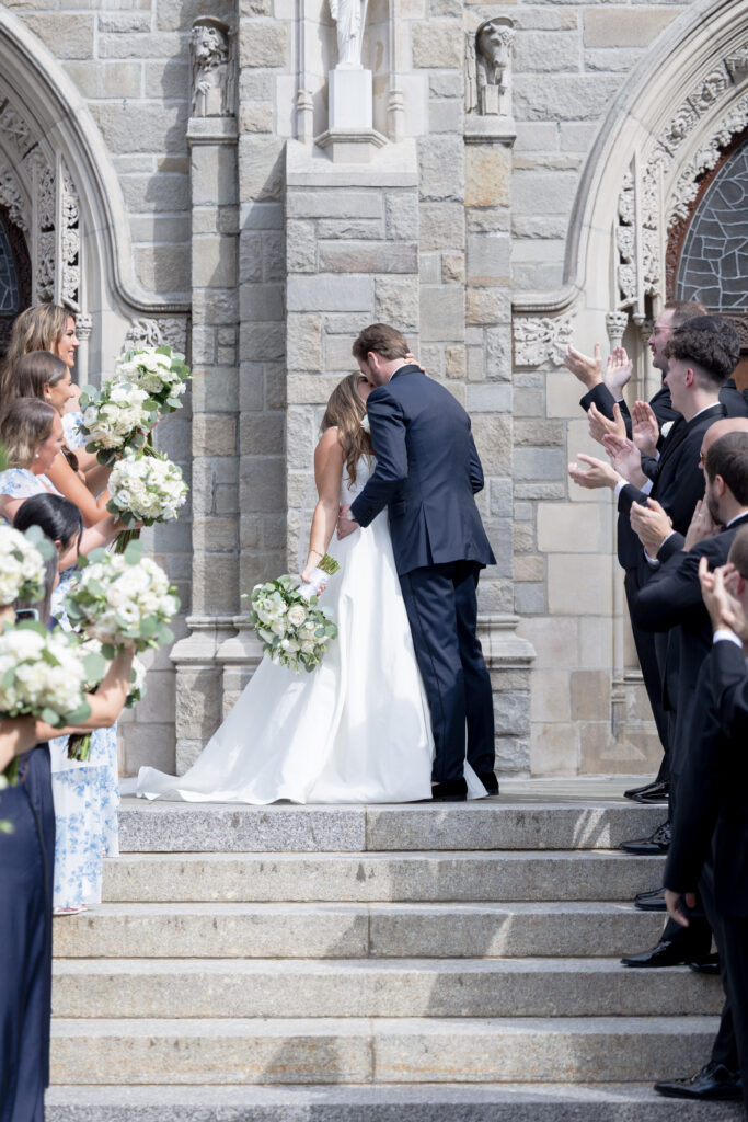 Bride and groom just married portraits outside church