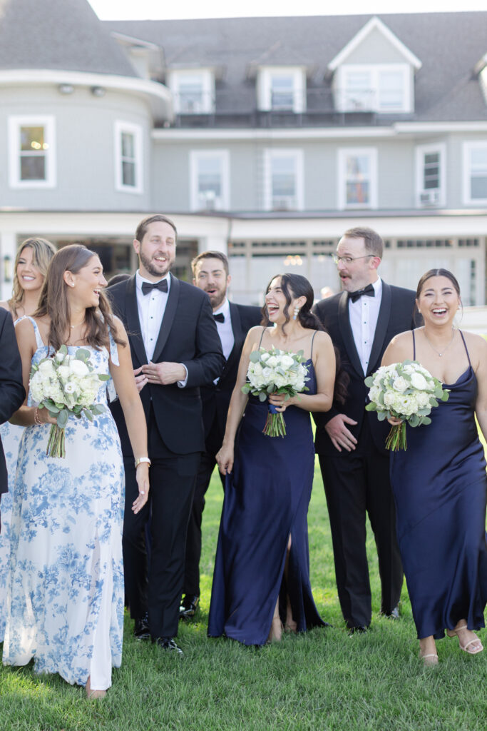 Wedding party portraits in front of Orienta Beach Club