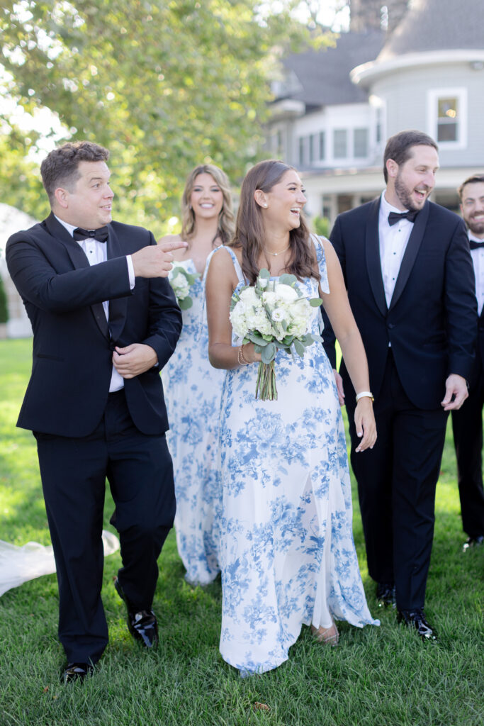 Wedding party portraits in front of Orienta Beach Club