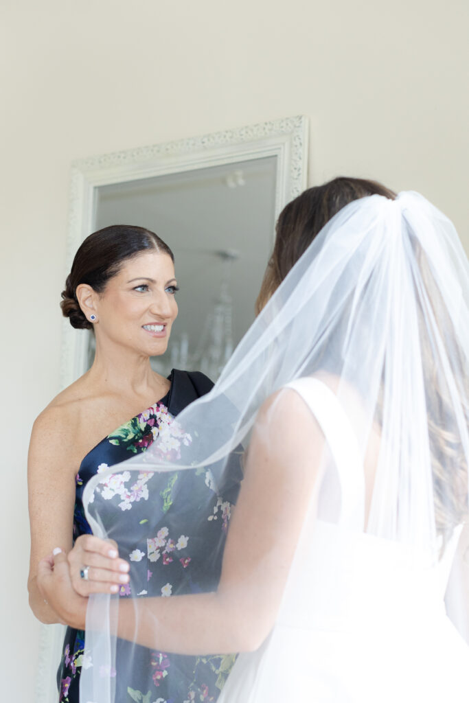 Bride and mom inside the bridal suite