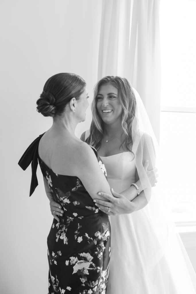 Bride and mom inside the bridal suite