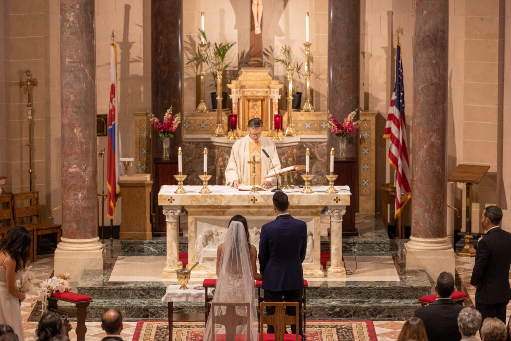 Wedding ceremony inside St. John Nepomucene Church in Manhattan, NYC