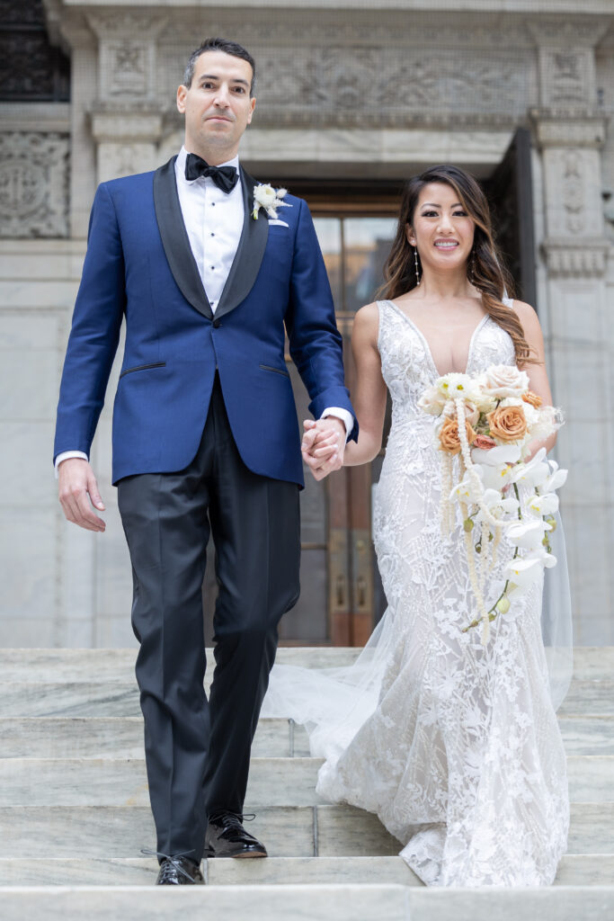 Wedding portraits at New York Public Library on the white steps