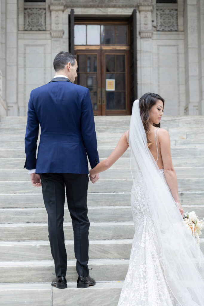 Wedding portraits at New York Public Library on the white steps