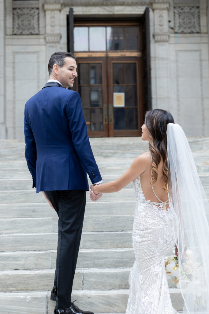 Wedding portraits at New York Public Library on the white steps