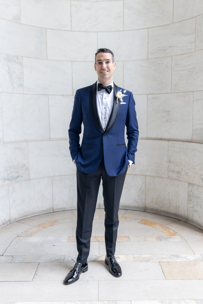 Groom portraits outside of the New York Public Library