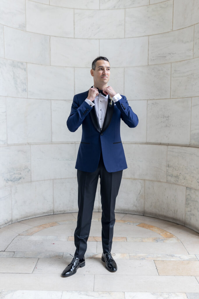 Groom portraits outside of the New York Public Library