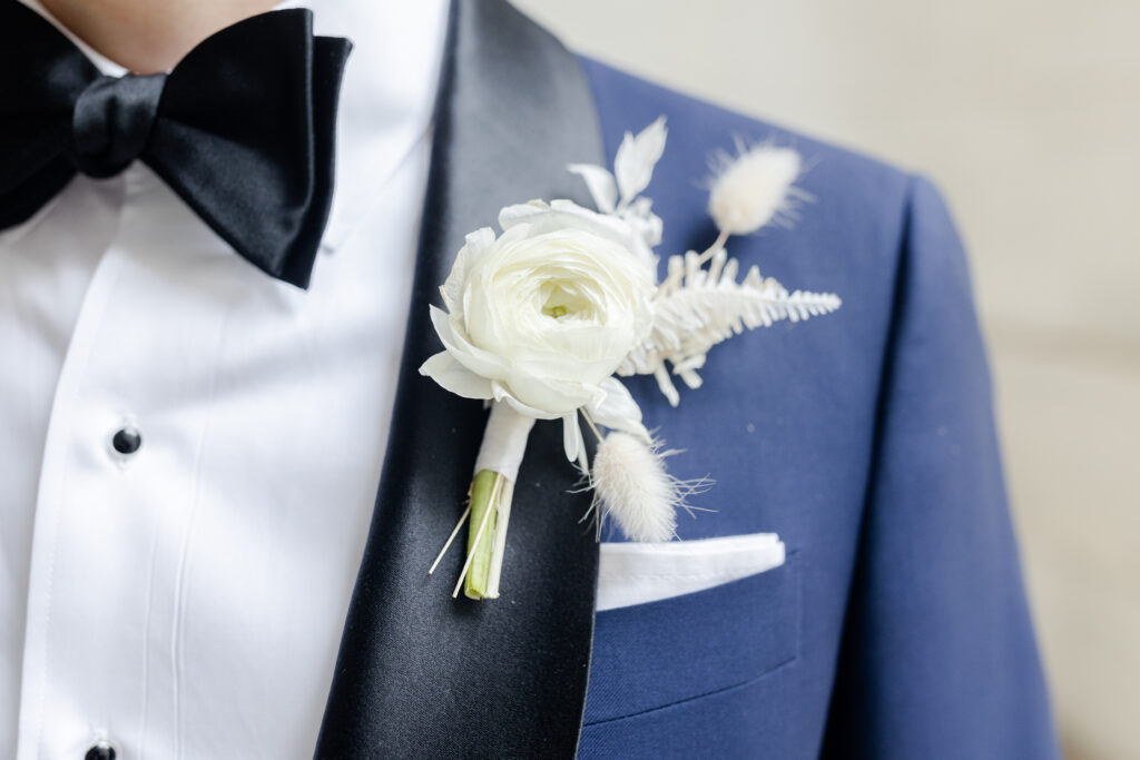 Groom boutonniere details close-up