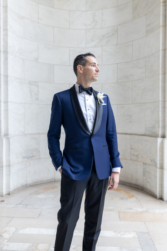 Groom portraits outside of the New York Public Library