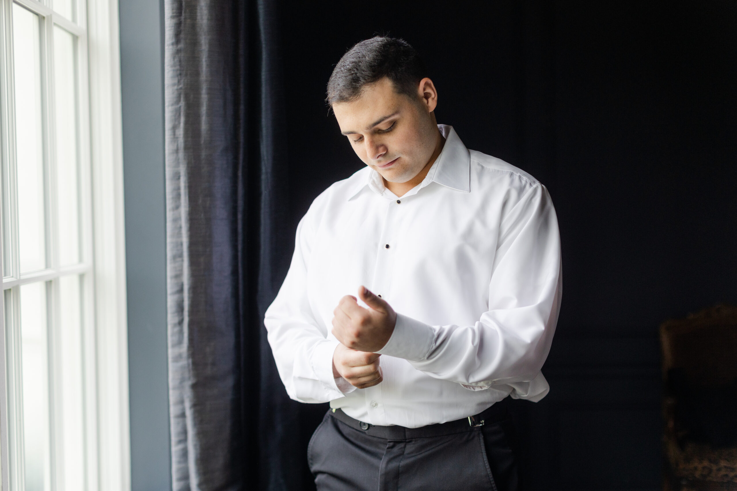 Groom Getting Ready at Grooms Suite inside Park Chateau Wedding Venue
