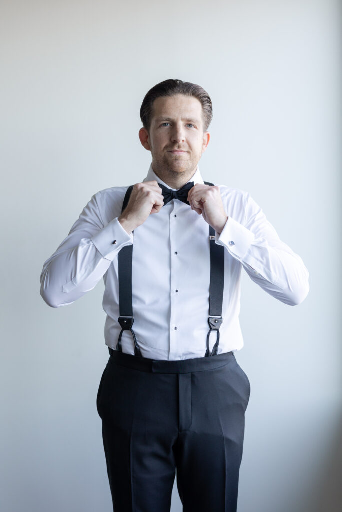 Groom Getting Ready_Tie Shot_Inside of Yacht Club Wedding Venue