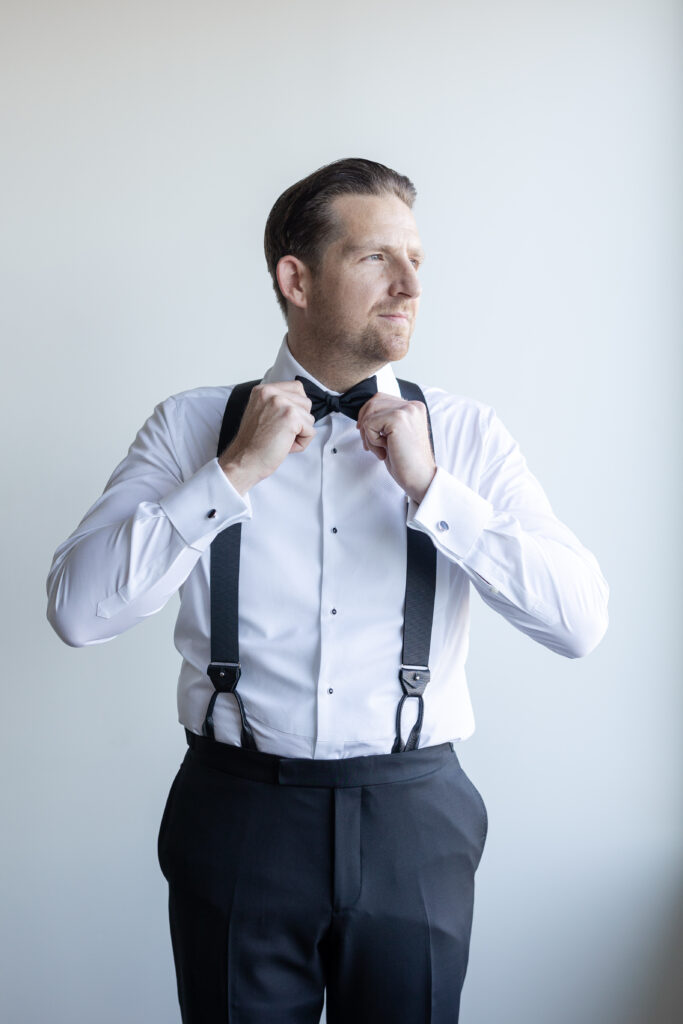 Groom Getting Ready_Tie Shot_Inside of Yacht Club Wedding Venue