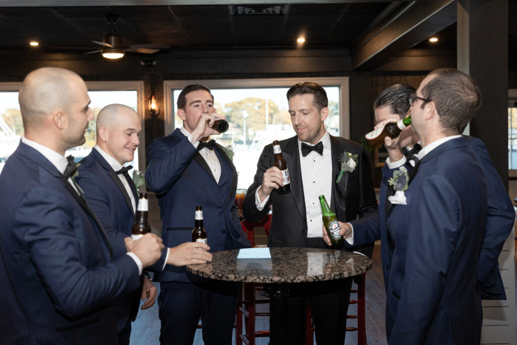 Groom and Groomsmen_Inside of Yacht Club Wedding Venue