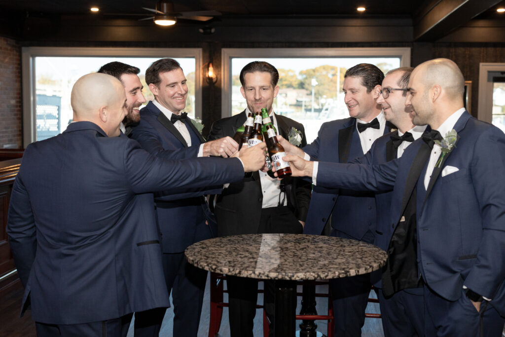 Groom and Groomsmen_Inside of Yacht Club Wedding Venue