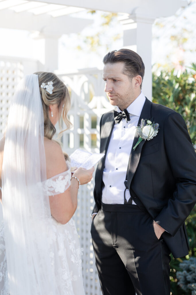 Bride and Groom_Reading Vows To Each Other Outside Venue