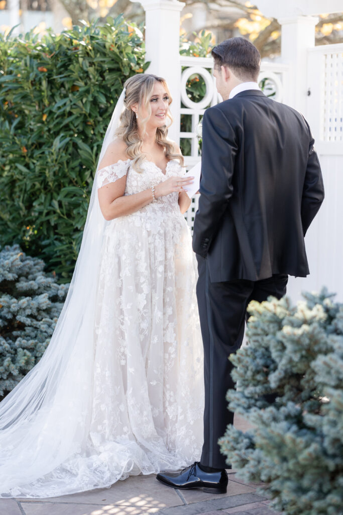 Bride and Groom_Reading Vows To Each Other Outside Venue