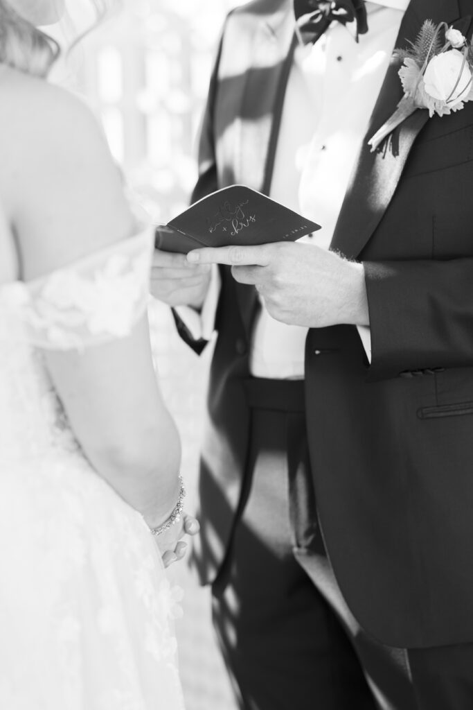 Bride and Groom_Reading Vows To Each Other Outside Venue