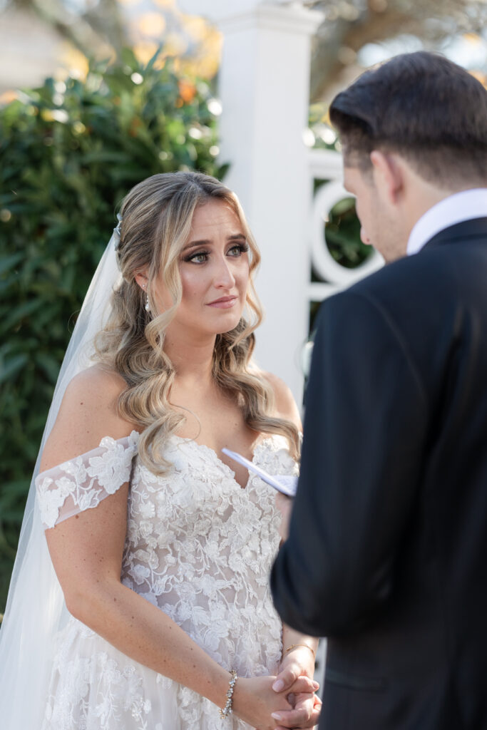 Bride and Groom_Reading Vows To Each Other Outside Venue