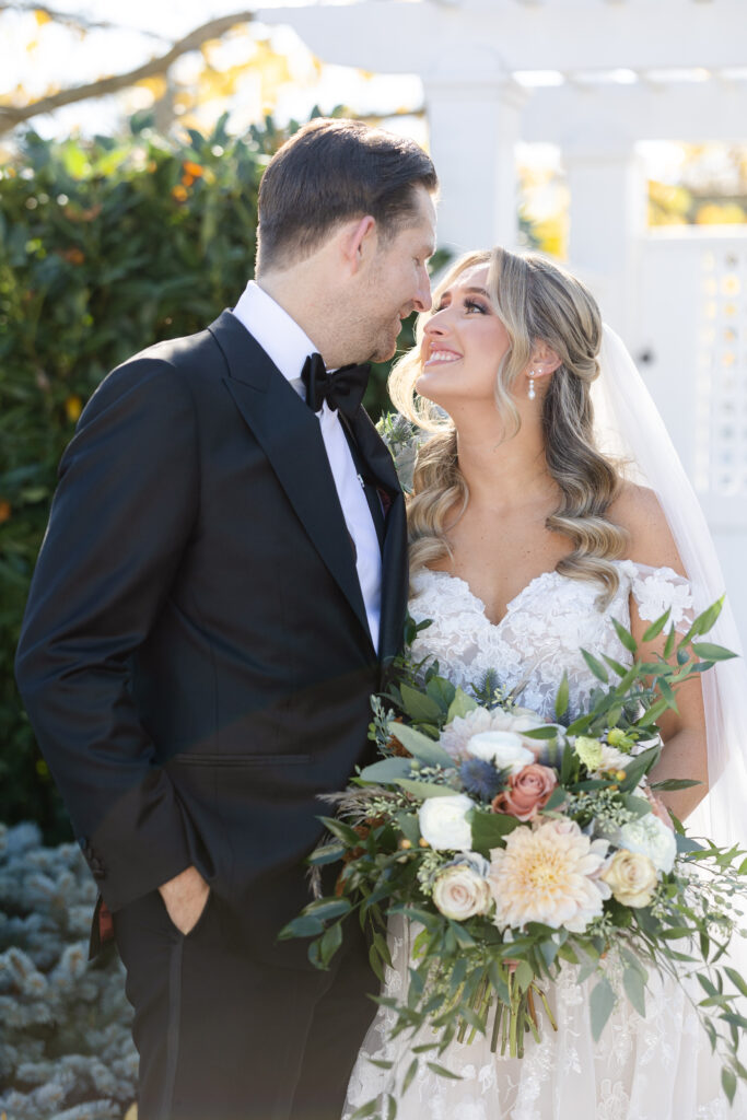 Bride and Groom Outdoor Couple Portraits in Yacht Club Wedding Venue