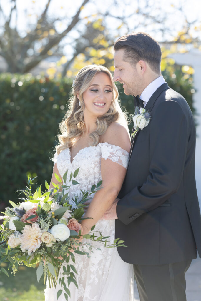 Bride and Groom Outdoor Couple Portraits in Yacht Club Wedding Venue