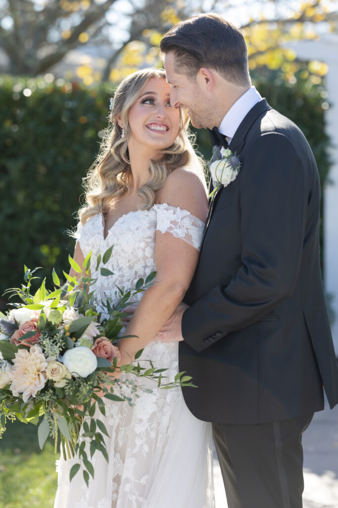 Bride and Groom Outdoor Couple Portraits in Yacht Club Wedding Venue