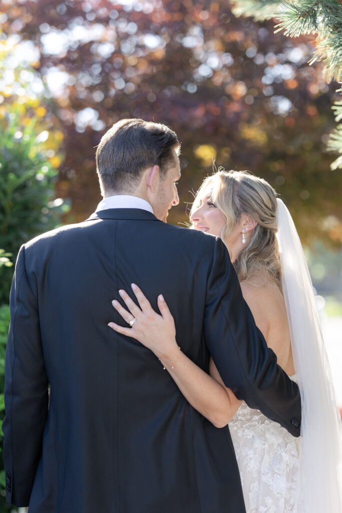 Bride and Groom Outdoor Couple Portraits in Yacht Club Wedding Venue