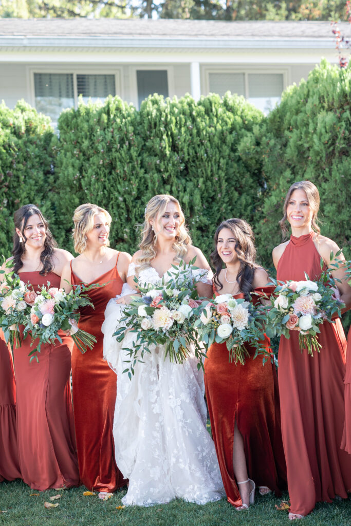 Bride and Bridesmaid Outdoor Portraits at Yacht Club Wedding Venue