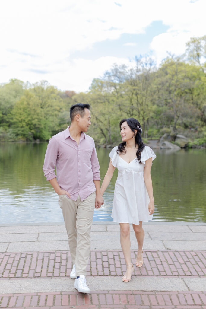 Romantic engagement session in front of Central Park Boathouse