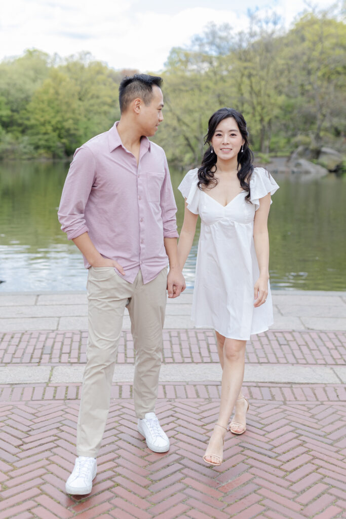 Romantic engagement session in front of Central Park Boathouse