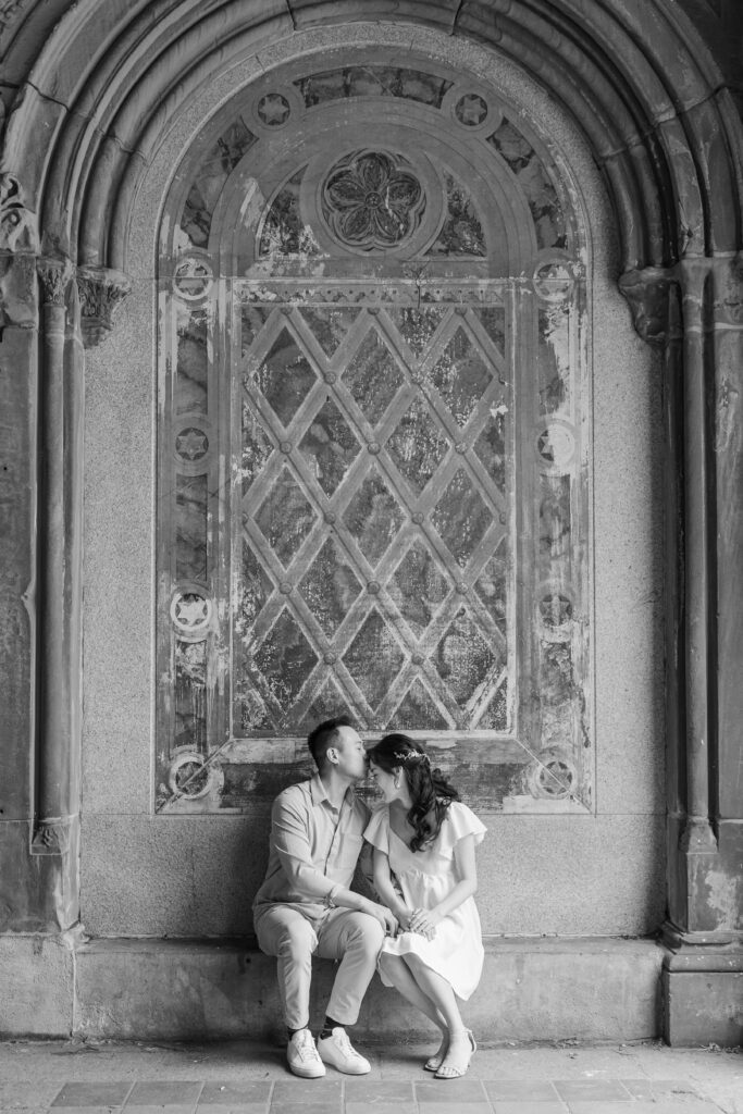 Black and white couple photos against Bethesda Terrace backdrop