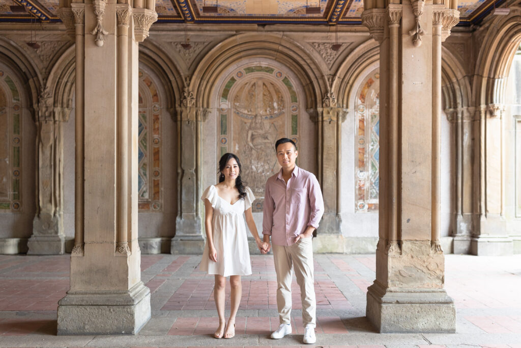 Couple photos against Bethesda Terrace backdrop