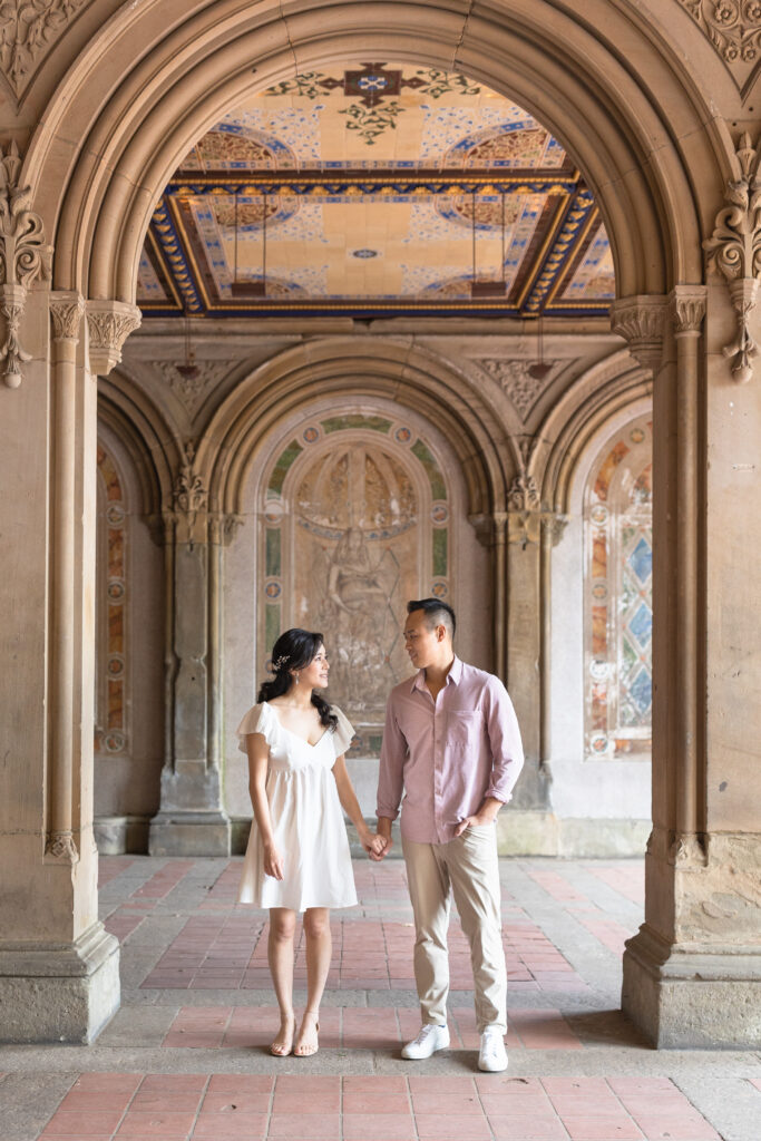 Couple photos against Bethesda Terrace backdrop