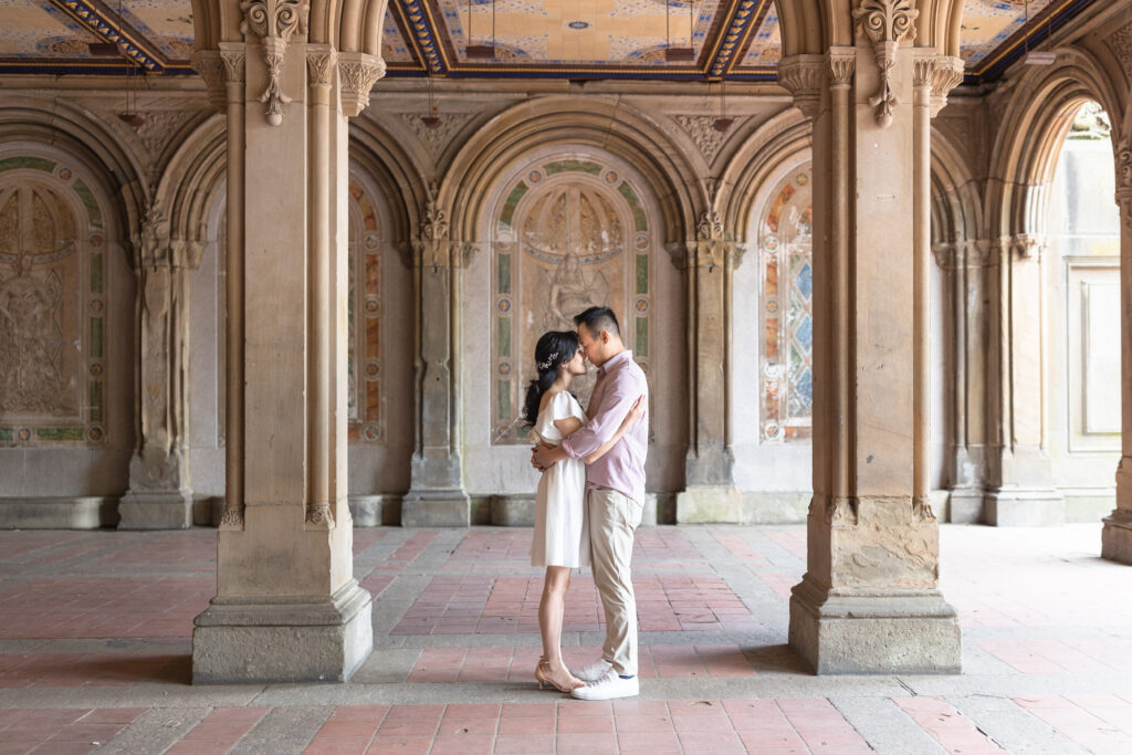 Couple photos against Bethesda Terrace backdrop