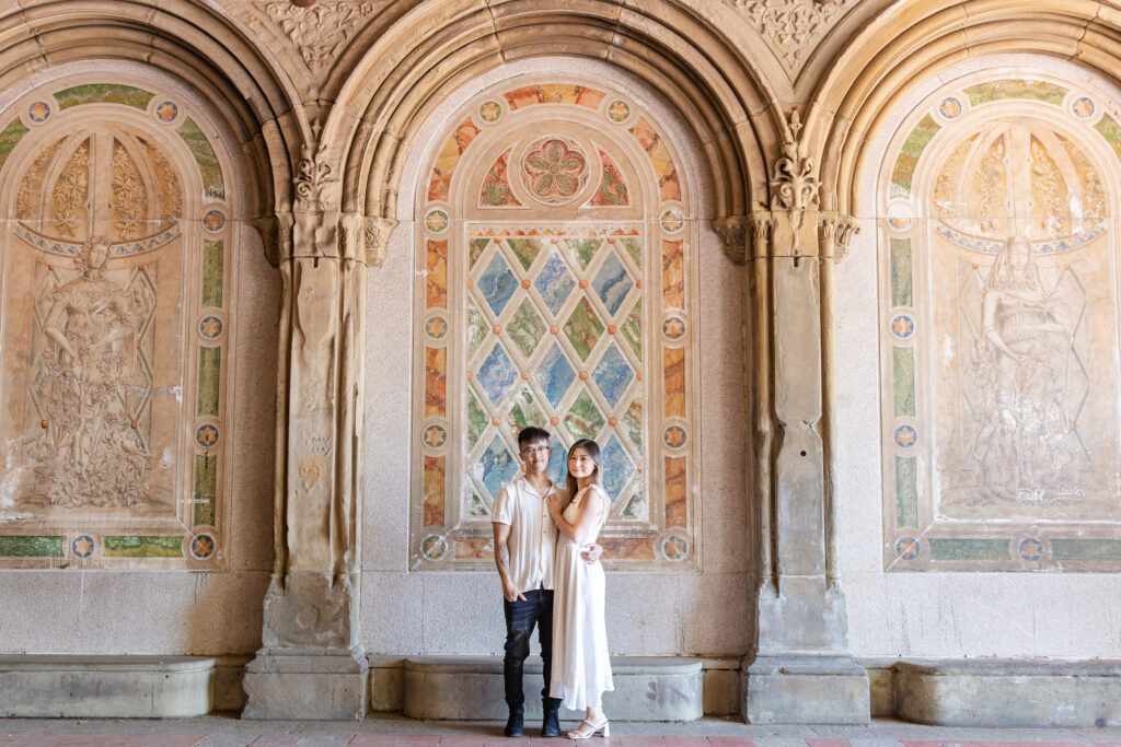 Engagement Couple in front of Central Park's Bethesda Terrace