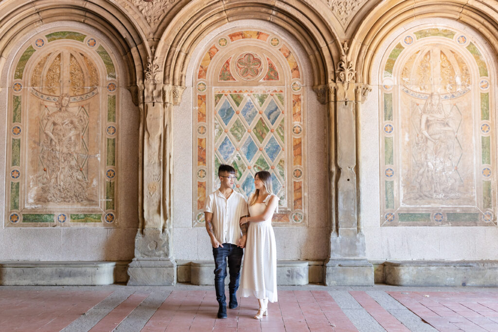 Engagement Couple in front of Central Park's Bethesda Terrace