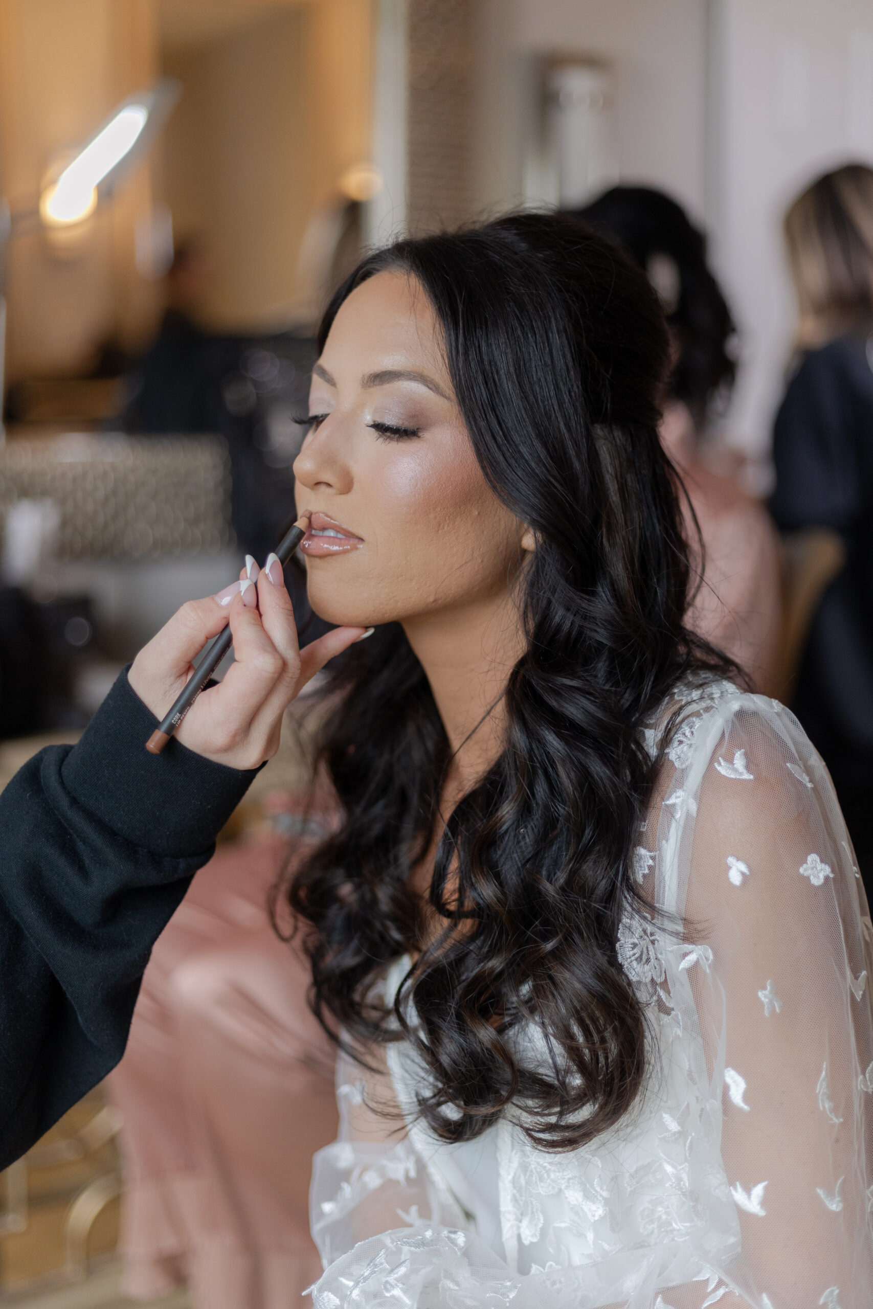 Bride getting make-up final touches at NJ Vineyard Wedding Venue