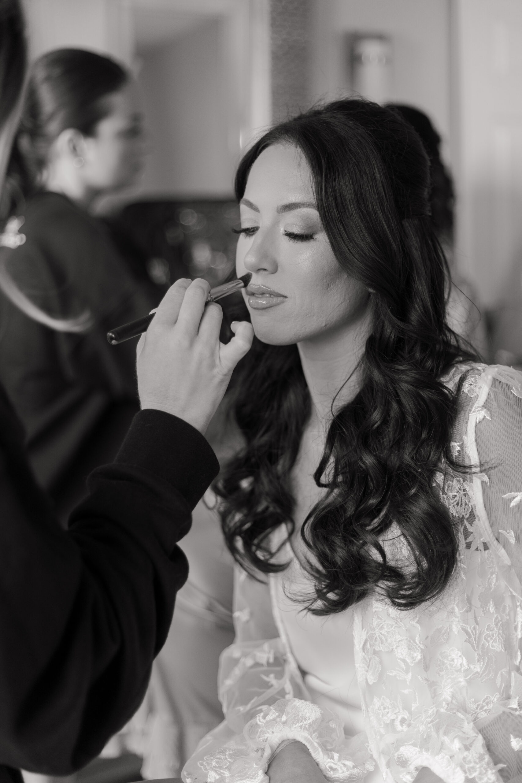 Bride getting make-up final touches at NJ Vineyard Wedding Venue